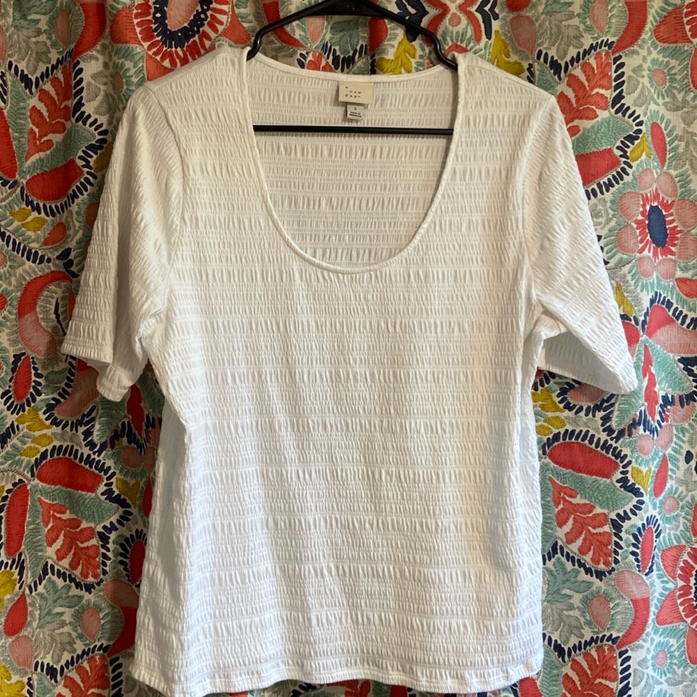 A new day top L